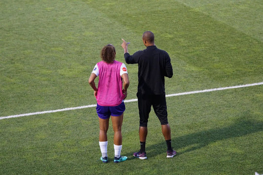 The Crucial Role of Coaches in Athlete Development: Shaping Future Champions - Sportoz